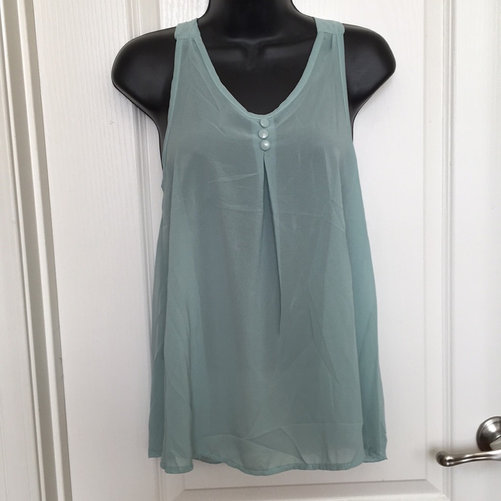 Green sleevless top